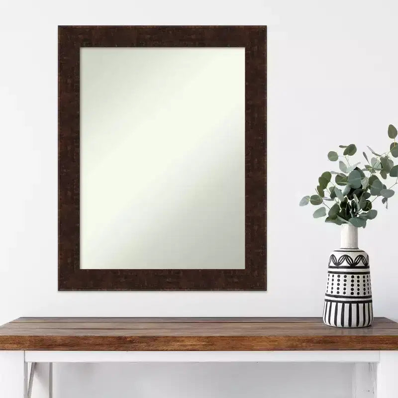 Espejo de pared estrecho de bronce moteado sin bisel de 22" x 28"